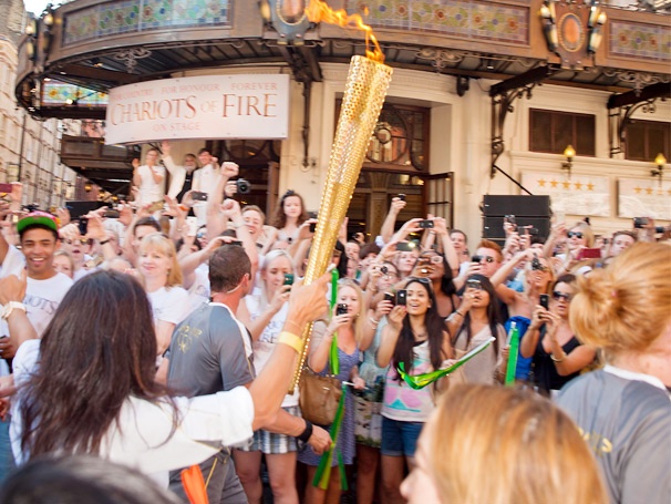 Let the Games Begin! The Cast of London’s Chariots of Fire Celebrates the Arrival of the Olympic Torch