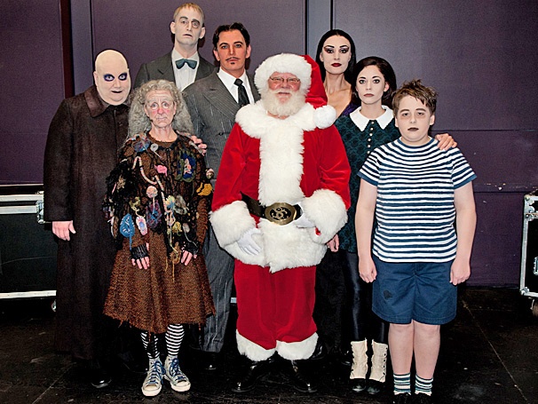 Ho Ho Horrible! The Addams Family Snaps a Holiday Portrait with Santa Claus in Costa Mesa
