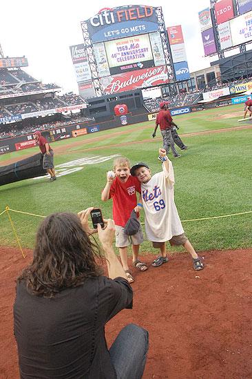 Will Swenson Sings at Mets Game - Will Swenson - sons (taking photo)