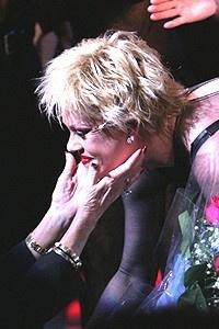 Melanie Griffith Chicago Opening - Melanie Griffith (Tippi holding her head)