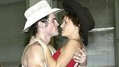 Bud and Sissy end the show in an embrace.