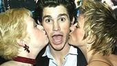 Matt Cavenaugh (center) gets some lovin' from co-stars Sally Mayes and Jenn Colella.