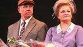 Onstage couple Tom Wopat and Faith Prince hold their lovely goodbye bouquets and listen intently as...