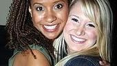 Rent's new Joanne, Tracie Thoms, gives Broadway baby Bailey Hanks a backstage squeeze.