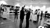 In an adjacent space, the 40-person company gathers to rehearse. Director/choreographer Marcia Milgrom Dodge checks in with Robert Petkoff, who stars as Tateh.