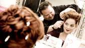 Melissa Errico clearly enjoys the period look her auburn wig gives her.