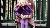 &ldquo;Slide with me, Mommy!&rdquo; The Broadway star is game.