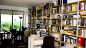 Three walls in Seldes’ living room are lined with books and keepsakes. The fourth is a wall of windows offering a breathtaking view of Central Park.