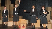 The Flying Karamazov Brothers (Rod Kimball, Stephen Bent, Paul Magid and Mark Ettinger) take a bow on their box-filled stage after a wild opening performance.