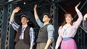 Newsies stars Ben Fankhauser, Jeremy Jordan and Kara Lindsay wave to the cheering audience.