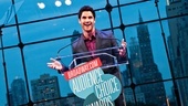 Darren Criss jokes with the crowd between awards.