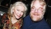 Little Flower director Philip Seymour Hoffman gets a little hug from Ellen Burstyn, who plays Therese. 