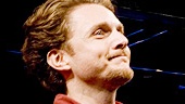 Jason Danieley steps forward to receive cheers for his performance as Dan.