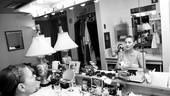 A barefaced Cherry Jones prepares to become a Victorian madam, as photos of her girlfriend, actress Sarah Paulson, look on.  