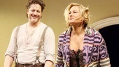 Brendan Fraser and Jennifer Coolidge grin widely during curtain call.