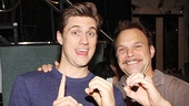 Hey, Aaron Tveit and Norbert Leo Butz: What are you celebrating? The Catch Me If You Can stars give us a sign signifying 100 Broadway performances. 
