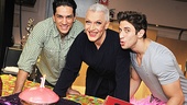 Priscilla leads Will Swenson, Tony Sheldon and Nick Adams gather to blow out a birthday candle on their luscious-looking glazed raspberry pie.