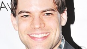 Newsies star Jeremy Jordan flashes his signature smile.  