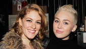 Pop star Miley Cyrus takes a moment with Dylis Croman, one of Chicago’s Merry Murderesses.  