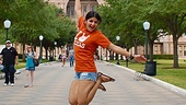 Mona Mostofi gets happy in front of Texas State Capitol.