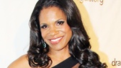 It’s the lady of the hour! Audra McDonald looks dazzling in a Tadashi Shoji gown.
