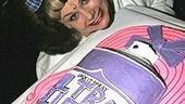 Hairspray star Carly Jibson poses with the huge gift.