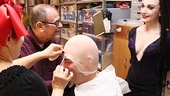 NY1 reporter Roger Clark begins his transformation into Uncle Fester under the careful hand of makeup designer Angelina Avallone and makeup artist Barry Berger, as Bebe Neuwirth looks on.