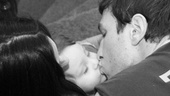 Mom and Dad send Temo off to school with a kiss. 