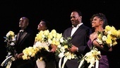 The Mountaintop team (director Kenny Leon, Katori Hall, Samuel L. Jackson and playwright Katori Hall) admire their congratulatory bouquets.