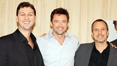 Hugh Jackman is sandwiched by Back on Broadway director/choreographer Warren Carlyle and musical director Patrick Vaccariello.