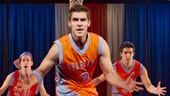 Josh Segarra as Mick and cast in Lysistrata Jones.