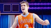 Josh Segarra as Mick and cast in Lysistrata Jones.