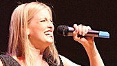 Wicked's Angel Reda takes the stage singing 
