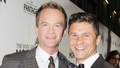 Look at these studs! Neil Patrick Harris and David Burtka flash two dazzling grins.