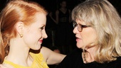 Jessica Chastain and Judith Ivey share a tender moment at the party.