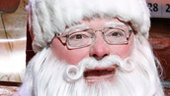 Wayne Knight as Santa in Elf.