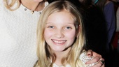 Bring It On head cheerleader Taylor Louderman gets an armful of the birthday girl!