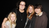 What a fabulous family! Vivienne gets some family love from her brother Blake, mom Rosie O’Donnell and her spouse, Michelle Rounds.