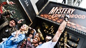 Outside at Studio 54, the cast members of Edwin Drood rep their show below the marquee.