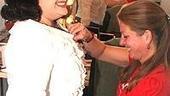 Dresser Kaye Gowenlock gets Winokur into Tracy garb.