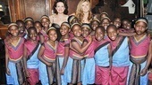 Pals and co-hosts Connie Britton and Carla Gugino get a backstage close-up with the African Children's Choir. 