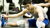 Alexander Aguilar (who plays 'Uardo) stretches out before getting to work.