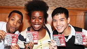 Wallace Smith, Uzo Aduba and Telly Leung show off newly signed copies of the Godspell cast recording.