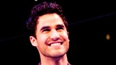 Darren Criss cracks up the audience with witty ad-libs between awards.