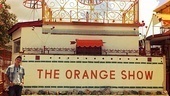 The Lion King actor checks out the Orange Show Center for Visionary Art. Featuring ponds, decks and shops, the Orange Show is a labyrinth of folk art designed to spotlight local artists.