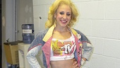“All ready for the top of the show! This is my look for the opening number. This is the only costume that doesn’t incorporate Sherrie’s main color palette of red and purple.”