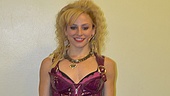 “This is my 30-second quick change in Act I. It takes three people to help change my boots, wig, take off the previous costume and zip me into this quick-rigged corset. Who knew you could become a stripper within 30 seconds!”