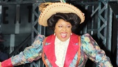 Newsies’ new Medda Larkin, LaVon Fisher-Wilson, looks as happy as she is colorful during the curtain call.