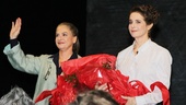 During the curtain call, the ladies are overwhelmed by the ovation.