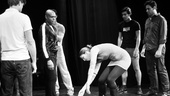 Movement consultant Laura Brandel walks cast members Sean Allan Krill, Nathan Lee Graham, Ben Diskant, Arturo Soria and Matthew Greer through choreography for the scene ahead.